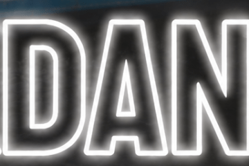 Tour boat on river with 'DEKDANSEN' text overlay and Dutch flag.