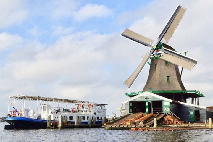 a small boat in a large body of water